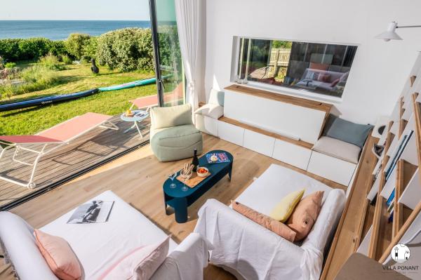 Villa Ponant 5 étoiles à Doëlan, piscine face mer, จอง  Clahars-Carnoet Finistère